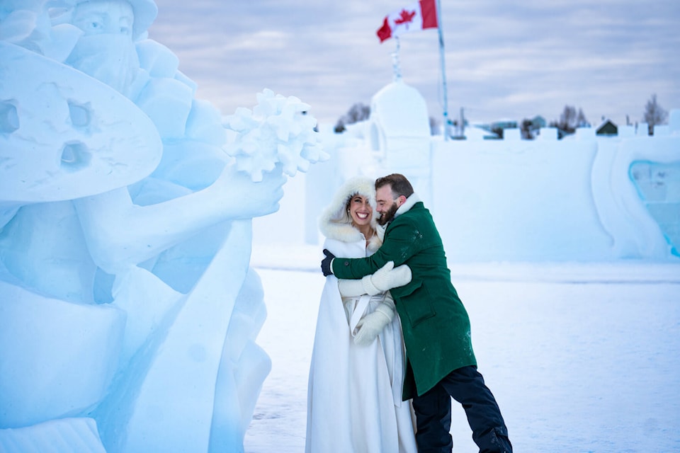 Matt Farrell hugs his bride Becky at the Snowking’s Winter Festival in Yellowknife. “Everyone that we contacted was so kind and helpful it made everything so much easier,” said Becky. Photo courtesy of Geoff’s Litrato (Geoffrey Rodriguez Photography) 
