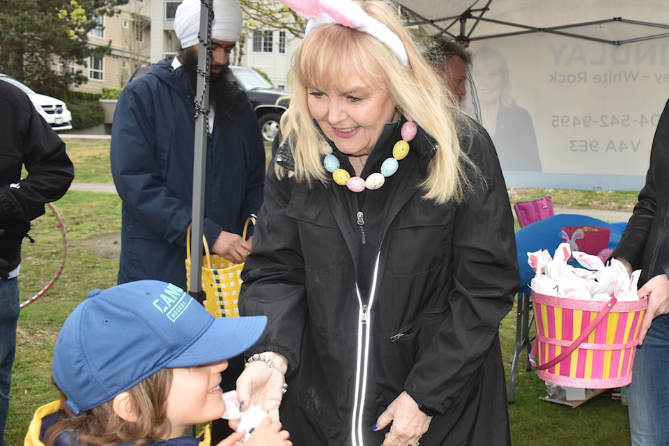 South Surrey-White Rock MP Kerry-Lynne Findlay held her annual Easter egg hunt Thursday (March 28) at Bakerview Park in South Surrey. Youngsters who attended collected a total of four plastic eggs to trade for sweet treats, including Kasper Noble, 5, who seemed happy to receive his reward. (Tricia Weel photo) 