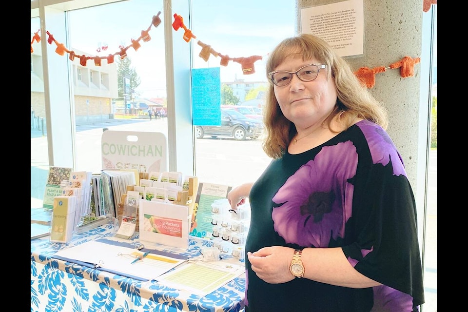Duncan’s Cowichan Library branch manager Annette Van Koevering stands next to the seed library last year as it first kicked off. (Chadd Cawson/Citizen) 