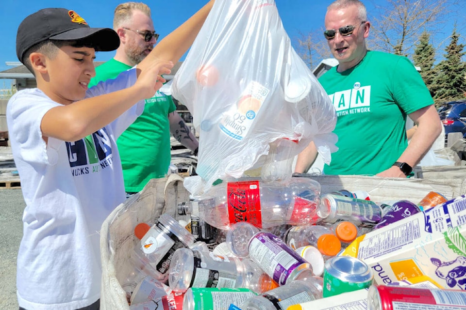A 12-year-old Ethan Saran helped out at the 2023 bottle drive organized by his family for the Canucks Autism Network. (Black Press Media files)