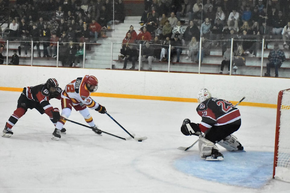 The Ridge Meadows Flames Jack Foster, seen here on a partial breakaway earlier in the series. He’s third in playoff scoring with 21 points in 14 games, and is in a big game on Monday afternoon. (Neil Corbett/The News) 