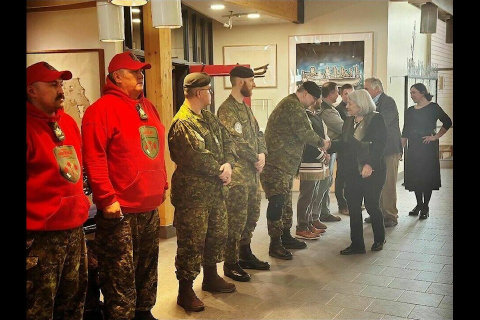 Governor General Mary Simon greets a line of Rangers from Joint Task Force in the legislative assembly in Iqaluit on April 1. Kira Wronska Dorward/NNSL Media 