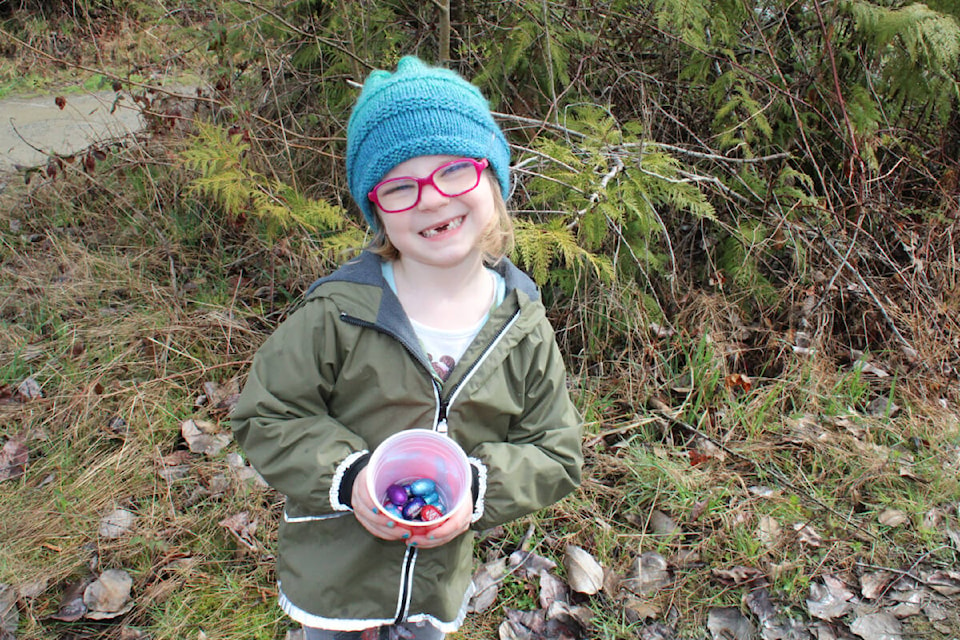 Freyja Brown, 5, gives a special smile as she shows off the eggs that she found at Arrowvale Campground and Collins Farm on Good Friday, March 20, 2024. (SONJA DRINKWATER PHOTO) 