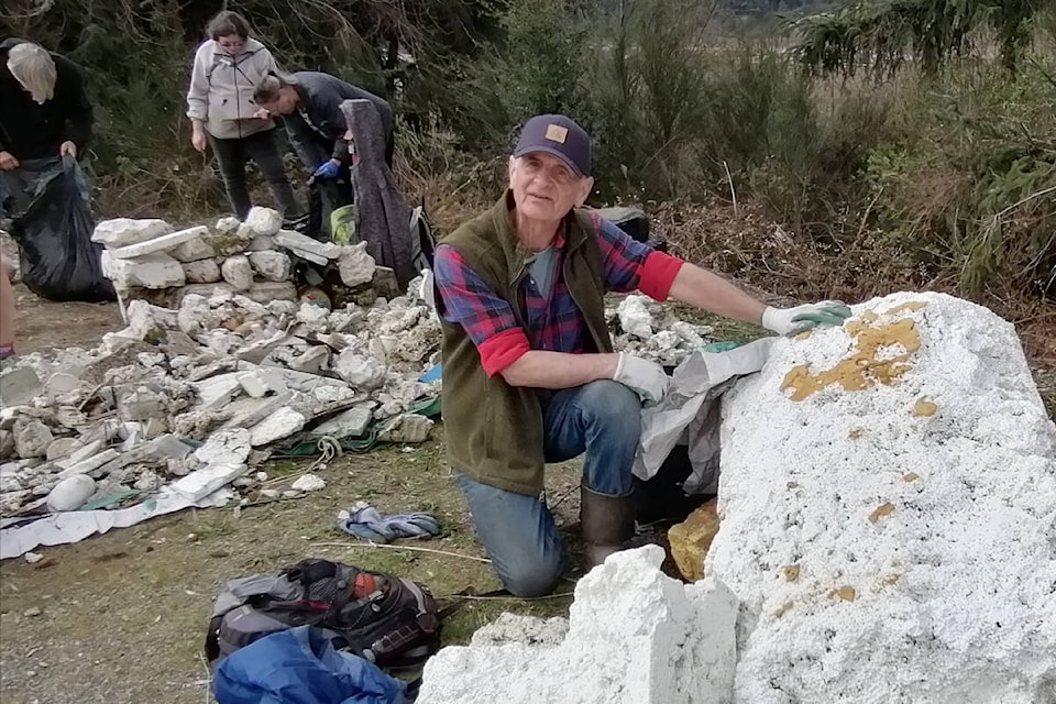 Dave Morton of Ocean Friendly Port Alberni examines a particularly large piece of styrofoam collected during an Easter weekend cleanup at the Somass Estuary. (PHOTO COURTESY GAIL MORTON, OFPA) 