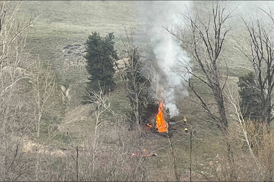 A bush fire was found on the mountain side off McCurdy Place on Tuesday, Apr. 2. (Gary Barnes/Capital News) 