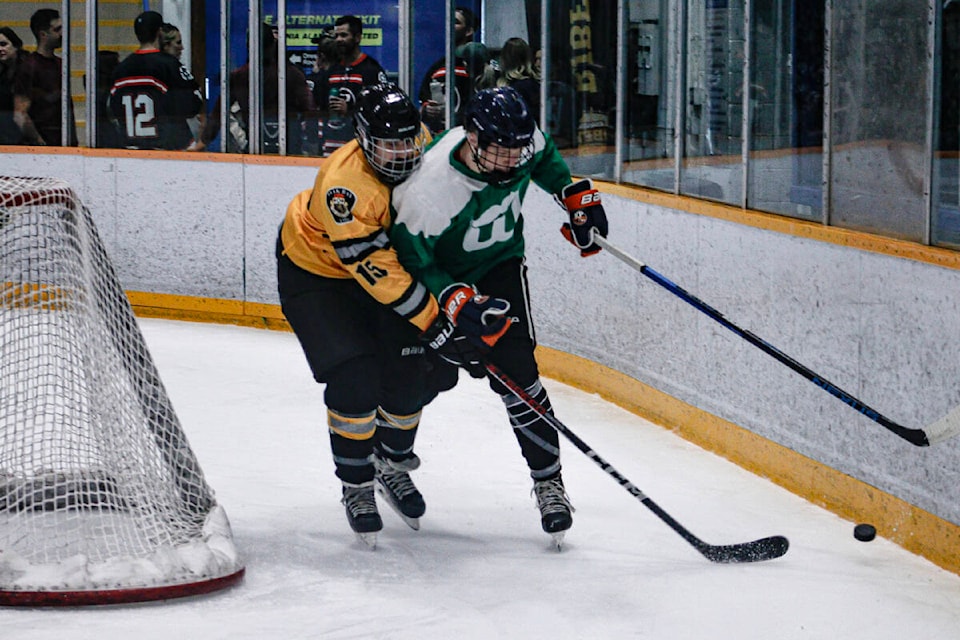 The Oak Bay Fire Department faces off against the Colwood and View Royal fire departments in the 2024 Ken Gill and Forrest Owens Memorial Hockey Tournament. (Bailey Seymour/Black Press) 