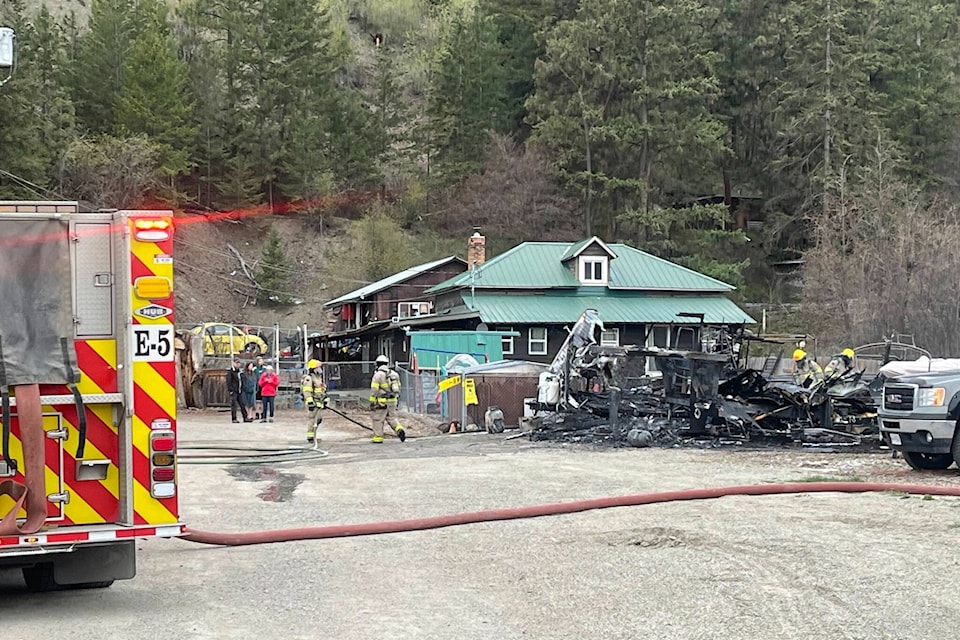 The Kelowna Fire Department and other emergency crews were called to a rural property at Glenmore Road North and Begbie Road for reports of a travel trailer on fire around 9 a.m. Monday, April 8, 2024. (Jacqueline Gelineau/Capital News) 