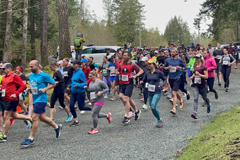 Runners start the McLean Mill 10K through the parking lot at Port Alberni’s national historic site on April 7, 2024. (CYRIL RODGERS PHOTO) 