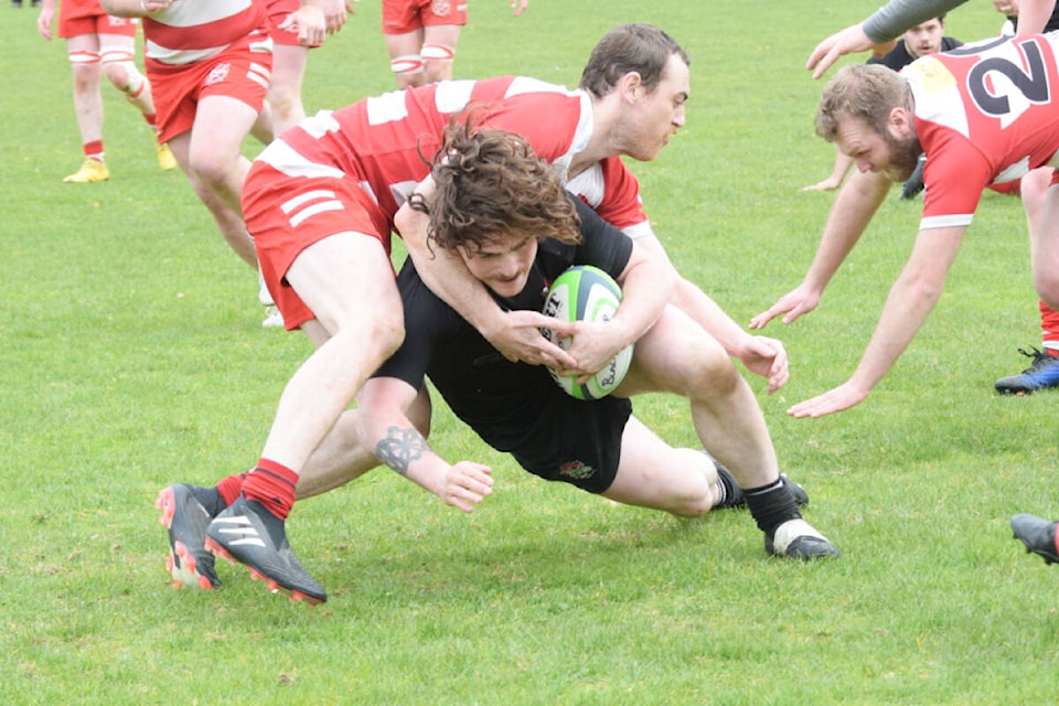 Port Alberni’s Aaron Badovinac is taken down by a player from the Vancouver Rowing Club during rugby action on Saturday, April 6. (ELENA RARDON / Alberni Valley News) 