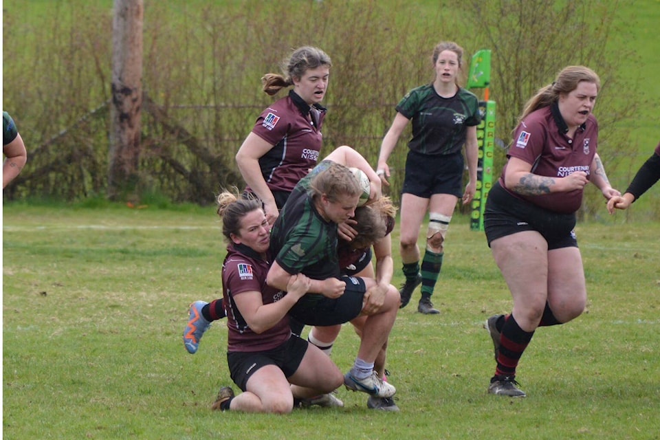 Comox Valley Kickers scrumhalf Tyra Schaad making a tackle on a Duncan player in a match the Kickers won 55-14. Photo by Ben Julien 