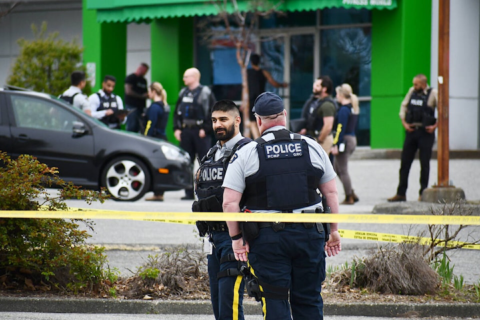 Numerous police officers were gathered in front of the Katana restaurant and Fitness World on Willowbrook Drive on Wednesday, April 10, after shots were fired in the area. (Matthew Claxton/Langley Advance Times) 
