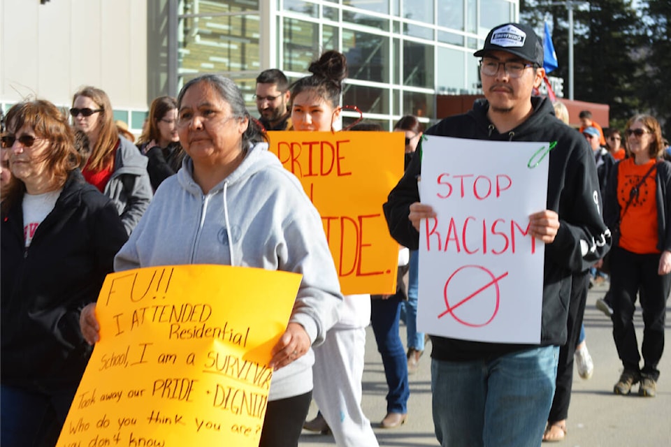 Marchers from near and far took to the streets of Quesnel calling for local truth and reconciliation improvements, and the resignation of Quesnel mayor Ron Paull. (Frank Peebles photo - Quesnel Cariboo Observer) 