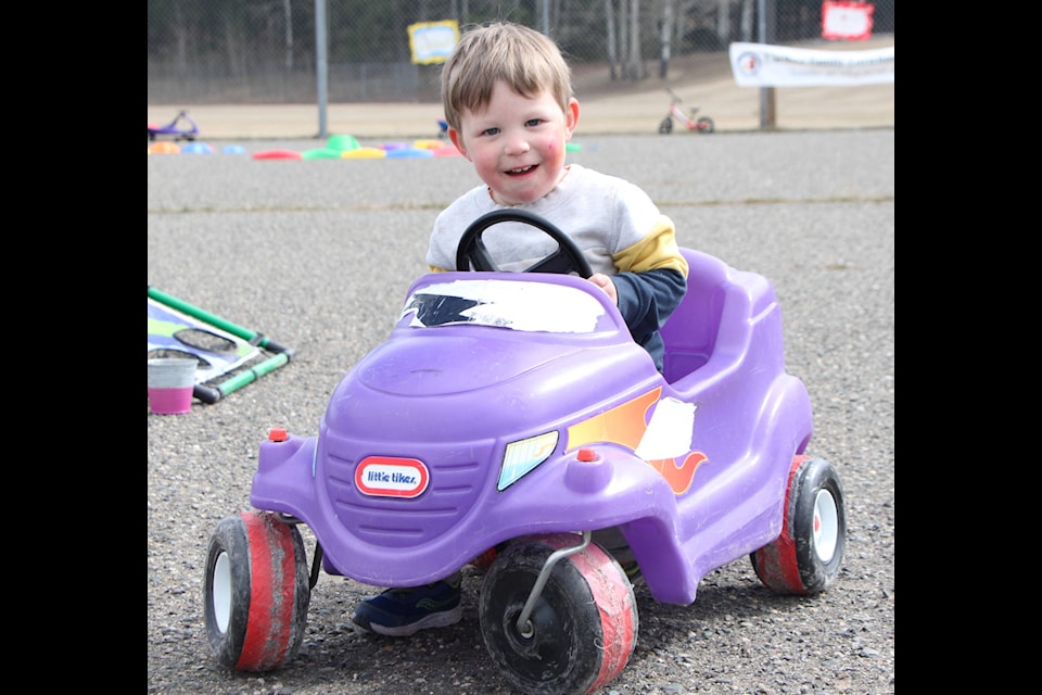 Greyson Dykstra rides around in a buggy on Saturday, April 8, 2024 at Blue Sky’s Autism Services Autism Awareness Day. (Patrick Davies photo - simplymastery) 