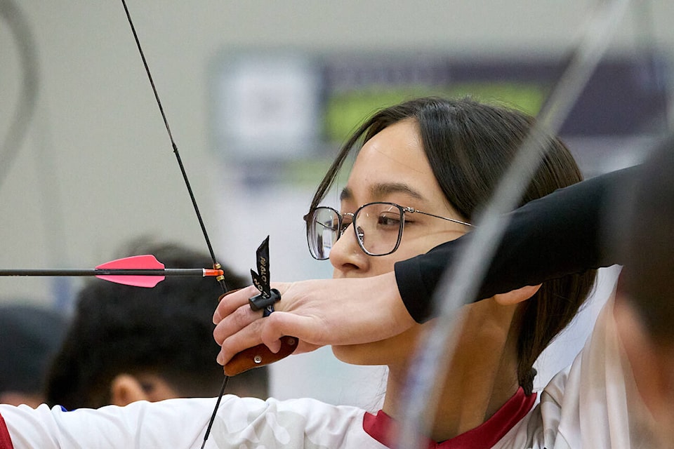 Team Yukon archer Mya Wilson lines up a shot during the barebow and compound archery at the 2024 Arctic Winter Games. (Stephen Anderson-Lindsay/Team Yukon) 