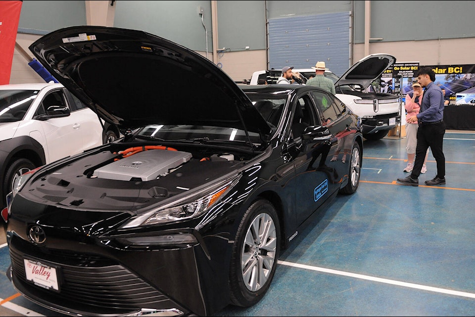 Electric vehicles are seen during the Rotary Climate Fair at the Chilliwack Landing Sports Centre on Saturday, April 13, 2024. (Jenna Hauck/ Chilliwack Progress) 