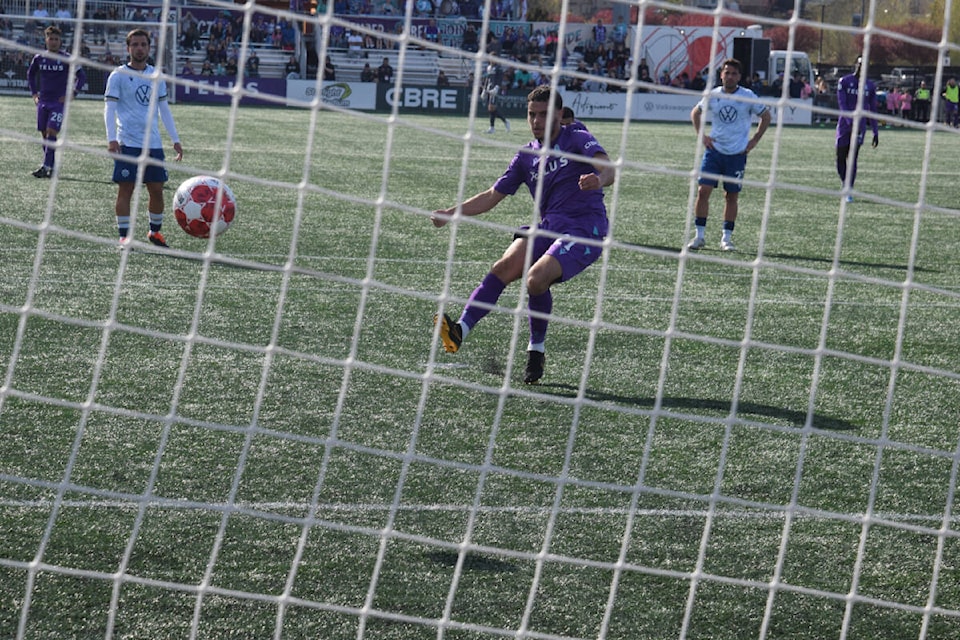 Ayman Sellouf drives the ball into the top right corner. (Thomas Eley/News staff) 