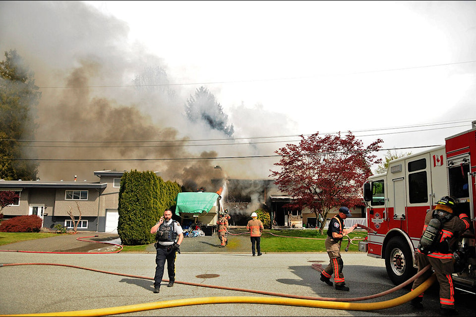 The Chilliwack Fire Department was called to this house fire on Bonavista Street on Tuesday, April 16, 2024. (Jenna Hauck/ Chilliwack Progress) 