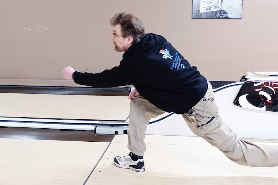 Robert Beiswanger rolls another five-pin bowling strike. The Quesnel bowler attended the national Special Olympics tournament as a member of the Dawson Creek Headpins team. (Photo submitted) 