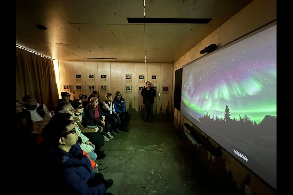 Guests get a look at the 3D theatre, which is a feature of the new Yellowknife Skies of Wonder exhibit at the Visitors Centre. Kaicheng Xin/NNSL photo 