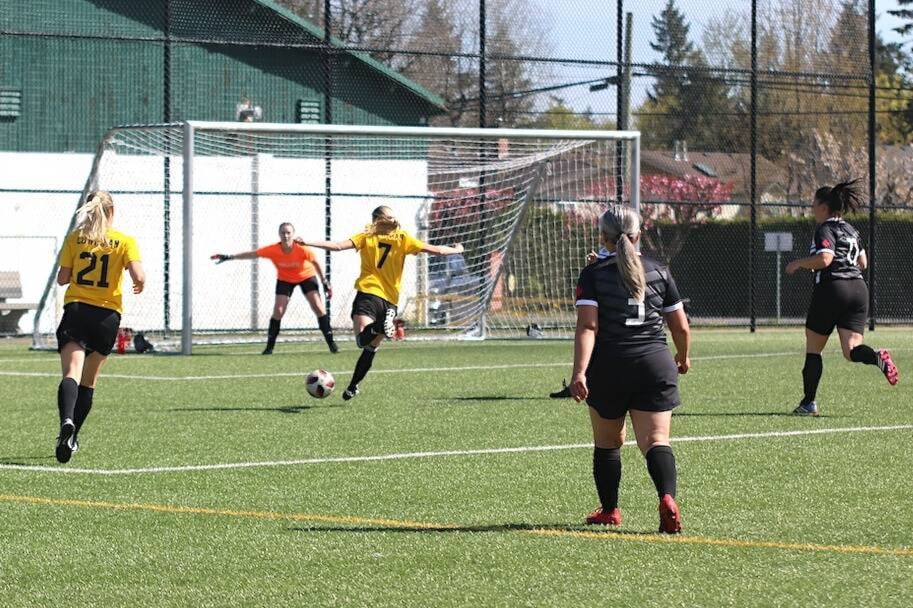 Cowichan attacker Monni Savory fires a shot at the Langley goal during quarter-final action at the Sherman Road turf on Sunday, April 14. (Sarah Simpson/Citizen) 