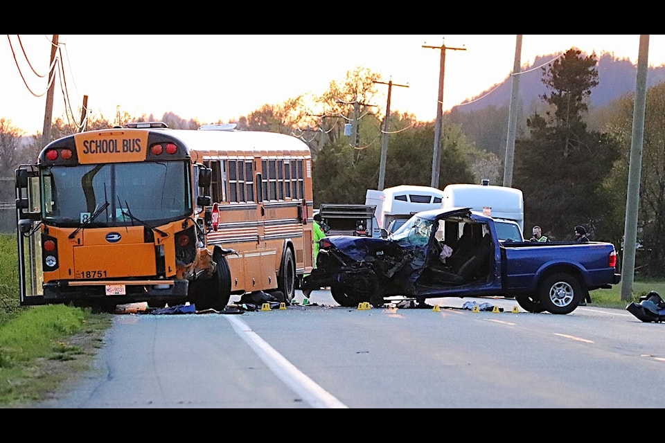 A head-on collision involving a school bus on Lougheed Highway outside Mission has sent the driver of the other vehicle to hospital with serious leg injuries. Police say the bus driver sustained minor injuries but the two students were unharmed. /Shane MacKichan Photo 