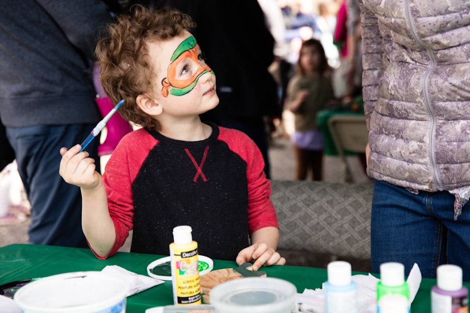 Call Jespersen paints his own painted turtle during the White Lake Turtle Festival at the White Lake Community Hall on Saturday, April 13, 2024. (Kayleigh Seibel Photography) 