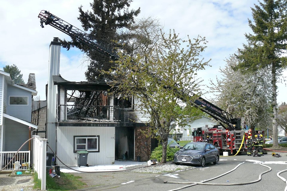 No people were hurt in a fire that damaged four houses in Aldergrove Saturday morning. The call came in around 9:30 a.m. in the area of Davis Crescent and Springfield Drive. (Dan Ferguson/91ԭ Advance Times) 