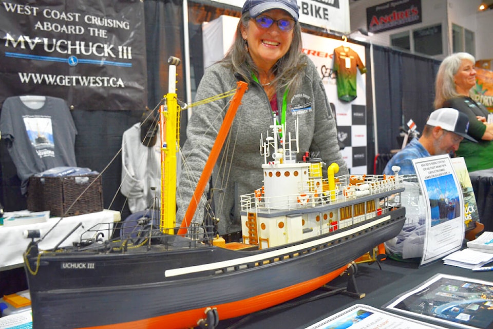 Julie Schimunek was happy to talk about the legendary Uchuk III at the Outdoor Adventure Show at Strathcona Gardens Saturday and Sunday, April 20-21. Photo by Alistair Taylor/Campbell River Mirror 