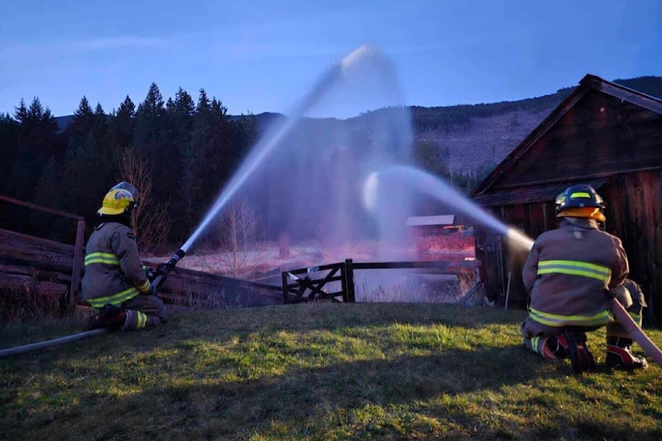 Firefighters with Cherry Creek Volunteer Fire Department practice drafting and pumping techniques at McLean Mill National Historic Site in March 2024. (PHOTO COURTESY CHERRY CREEK VFD) 