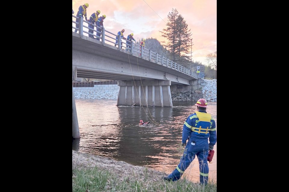 One rescue scenario involved a lasso-type rope rescue technique, where rescuers dropped a looped rescue line into the water to lasso people drifting down the river, then walking them towards shore. 