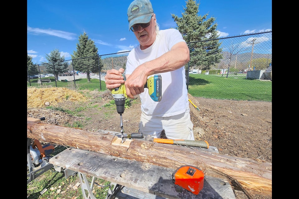 Keith Himmelreich was busy on April 13 getting frames ready for new composting bins for the Public Learning Garden. Like a lot of the projects in the garden, they are built and maintained by volunteers. Photos: Karen McKinley 