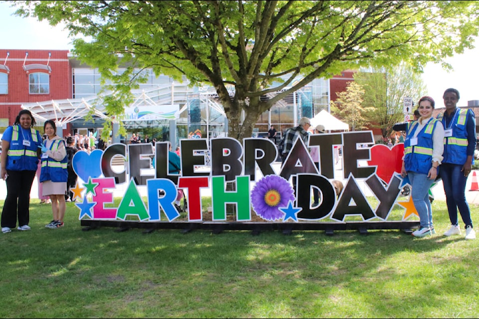 Dozens of volunteers helped run the Earth Day celebration in Memorial Peace Park on Saturday. (Brandon Tucker/The News) 