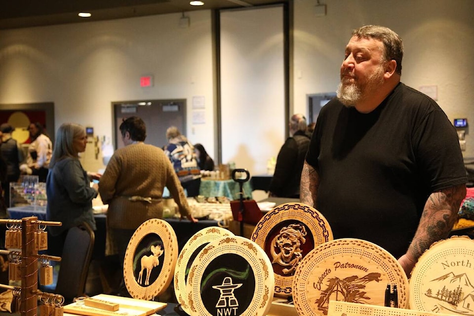 Kevin Butt was selling some of his custom board games at the market. Kaicheng Xin/NNSL photo 