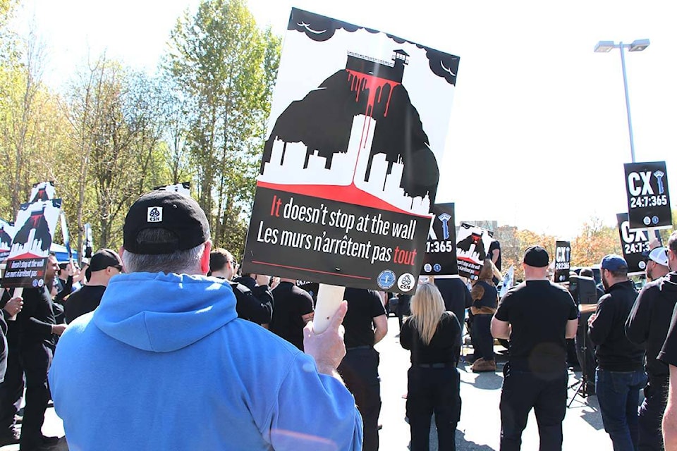 More than 100 members of the Union of Canadian Correctional Officers held a rally in Abbotsford on Thursday (April 18) over increased violence in correctional facilities. (Vikki Hopes/Abbotsford News) 