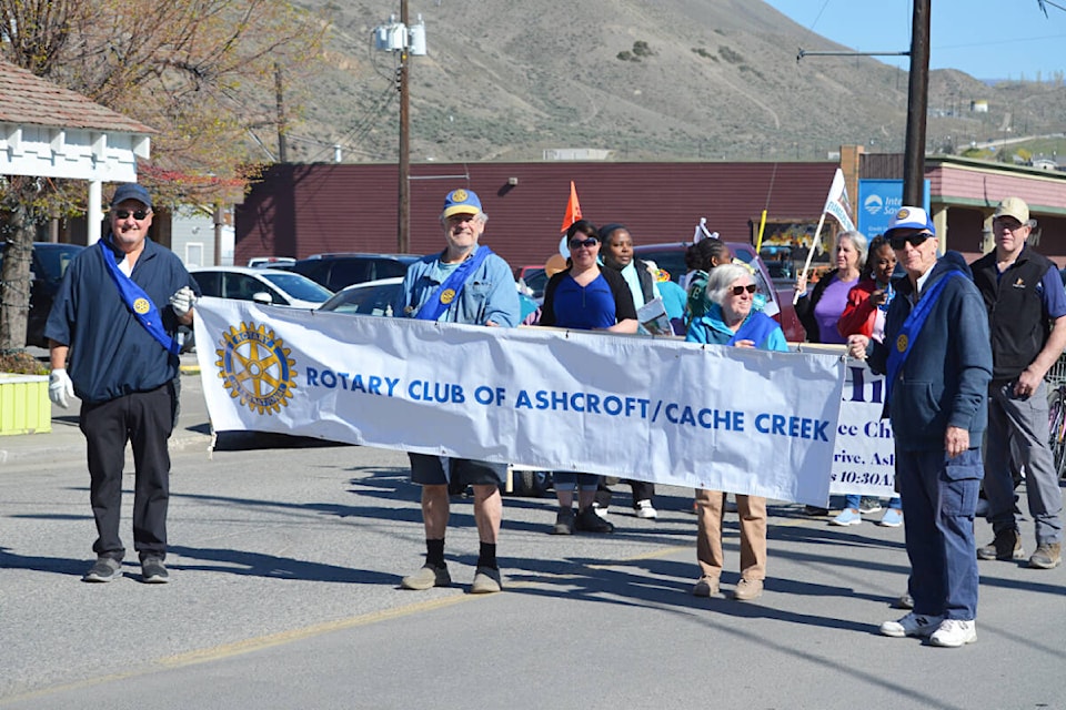 (from l, holding banner) Ashcroft-Cache Creek Rotary Club members Pache Denis, Joris Ekering, Barb Hood, and Ron Hood. (Photo credit: Barbara Roden) 