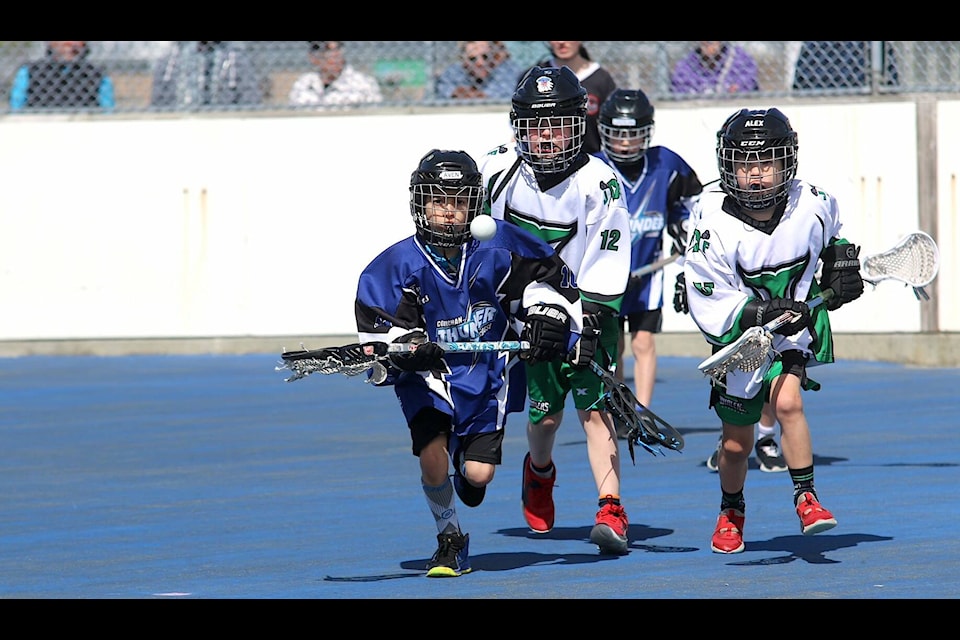 Cowichan U9 Thunder runner Aven Mann tacks the ball down during his team’s game against Juan de Fuca on Sunday, April 21 at the outdoor box at the Cowichan Sportsplex. Lacrosse season at all levels is now well underway in the Cowichan Valley. For more lacrosse coverage, see page 28. (Sarah Simpson/Citizen) 