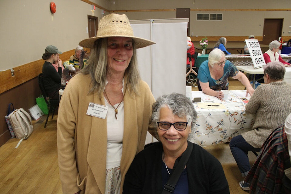 Kelly Carnochan and Corinda Williams of the 100 Mile and District Historical Society, which runs the 108 Heritage Site, both attended the District of 100 Mile House’s Volunteer Fair. (Misha Mustaqeem photo - simplymastery) 