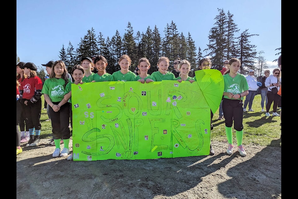 At the South Surrey White Rock Minor Softball Association’s opening day celebration at Sunnyside Park on Saturday, April 13, the U11 Sour Snipers won first place in the team cheer competition. (Contributed photo) 