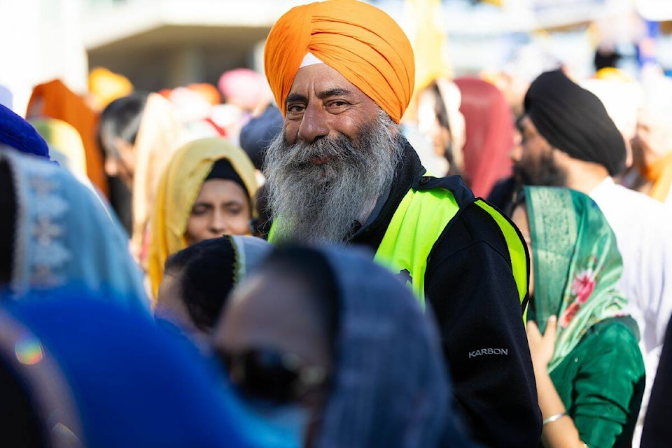 A volunteer at the Vaisakhi parade in Surrey on Saturday, April 20, 2024. (Photo: Anna Burns) 