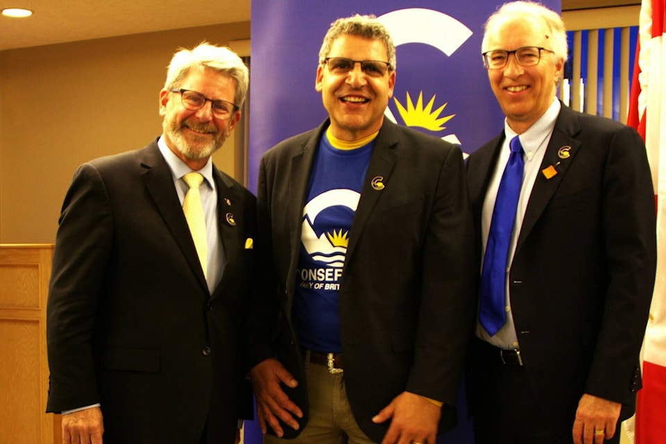 The B.C. Conservative Party held a “Rally in the Valley” at the Duncan Meadows Golf Club Course on April 24 that attracted more than 350 people. Pictured is John Koury (centre), Cowichan Valley’s Conservative candidate, flanked by house leader Bruce Banman (left) and party leader John Rustad (right). (Submitted photo) 