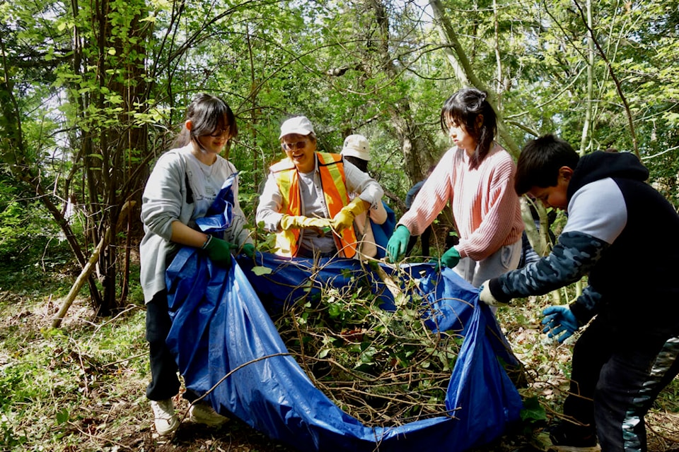 The Lower Mainland Green Team, in partnership with the City of White Rock, engaged the help of more than 100 H.T. Thrift Elementary school students and volunteers in a habitat restoration event at Ruth Johnson Park on Tuesday (April 23) for Earth Week. (Contributed photo) 