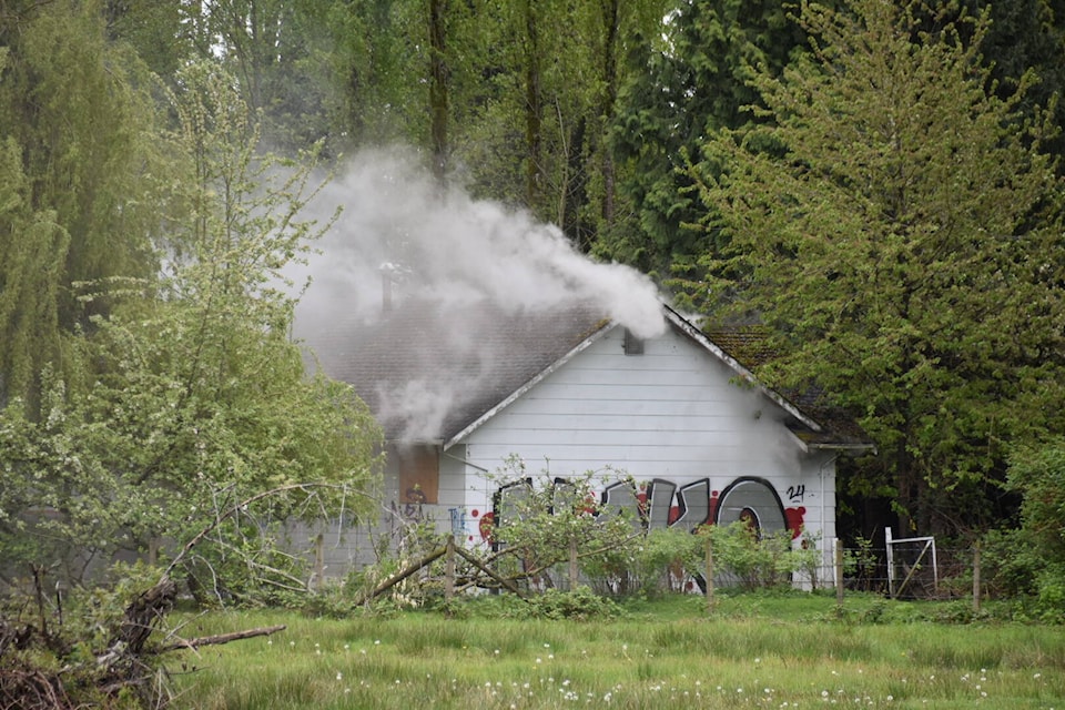 Surrey firefighters battled a blaze in a vacant house inn the 18900-block of Fraser Highway on Sunday (April 28) afternoon. (Curtis Kreklau photo) 