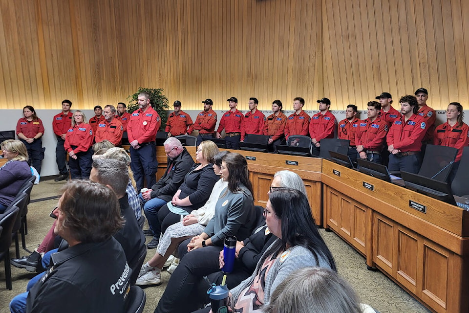 Members of the B.C. Wildfire Services’ Vernon Initial Attack and Unit crews attend the National Day of Mourning ceremony at Vernon City Hall Friday, April 26. Two BCWS firefighters were killed on duty in 2023, and four more lost their lives in a head-on crash heading home for days off after battling a fire. (Roger Knox - Morning Star) 