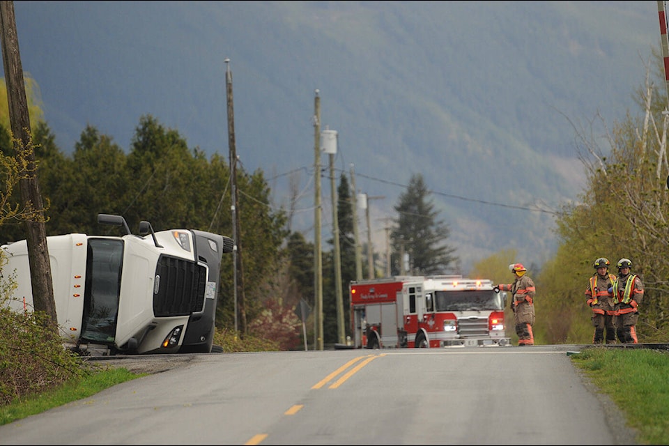 Emergency crews were on scene at Upper Prairie Road and the railroad tracks where this semi carrying live chickens went into a ditch on Tuesday, April 9, 2024. (Jenna Hauck/ Chilliwack Progress) 