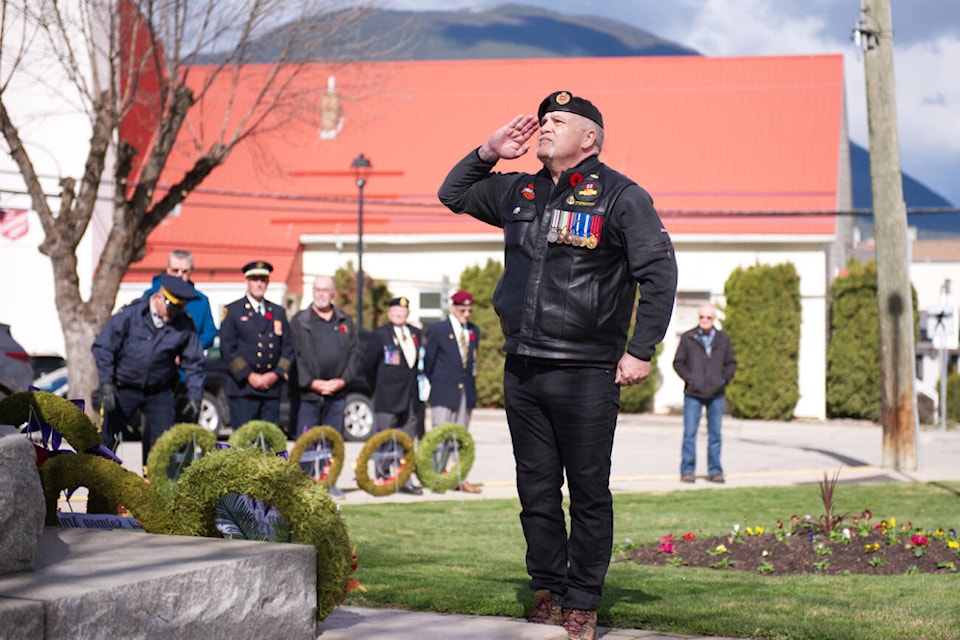 Veteran John Tedesco salutes after placing a wreath for the Canadian Army during a ceremony marking the Battle of Vimy Ridge held by the Salmon Arm legion on Tuesday, April 9, 2024. (Lachlan Labere-Salmon Arm Observer) 