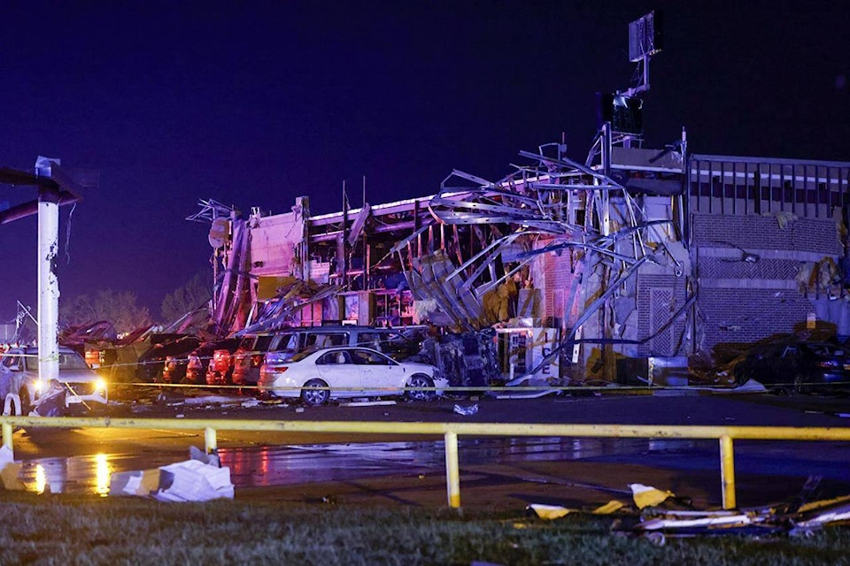The remains of Shell gas station damaged by a suspected tornado are seen, Sunday, May 26, 2024, in Valley View, Texas. Powerful storms killed at least seven people and left a wide trail of destruction Sunday across Texas, Oklahoma and Arkansas after obliterating homes and destroying a truck stop where drivers took shelter during the latest deadly weather to strike the central U.S. (Elías Valverde II/The Dallas Morning News via AP) 