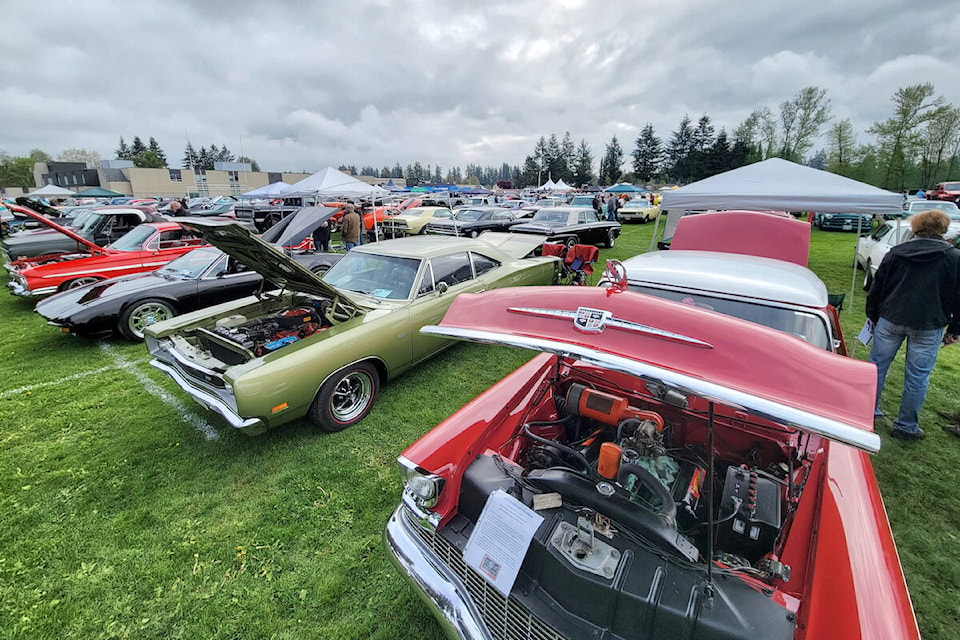  Hundreds of cars and even more car fans attend the annual D.W. Poppy car show. (Langley Advance Times files)  