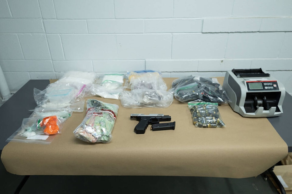 The Saanich Police Department executed search warrants on properties in Colwood and Langford on April 25. Seizing drugs, cash and a gun. (Photo Submitted/ Saanich PD) 