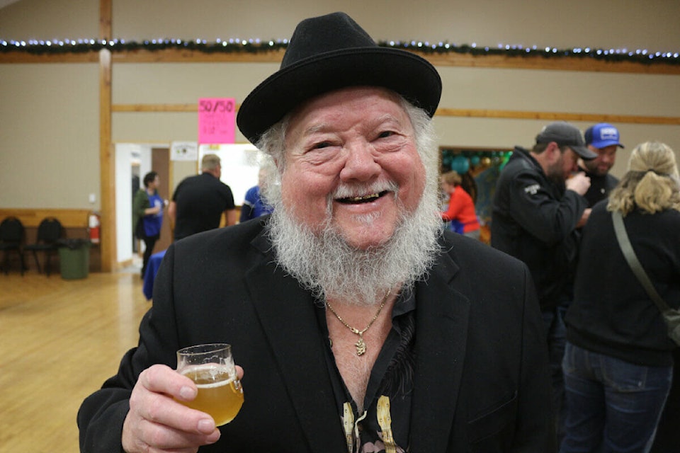 Dano Thompson holds up a drink at the Caribrew Beer Fest. (Misha Mustaqeem photo - 100 Mile Free Press) 