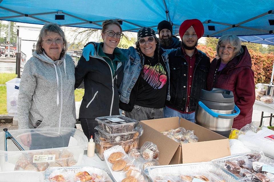 People Powered, Community Strong was founded by Christy Winters (centre) to feed and clothe those in need. /Bob Friesen Photo 